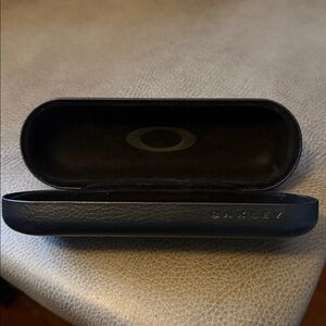 Oakley Dark black glasses Case, like new , hard cover